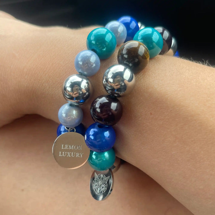 Armband unisex, met blauwe, zwarte en bruine tinten. Premium stainless steel. Gemaakt in Nederland. Unieke combinatie van materialen.