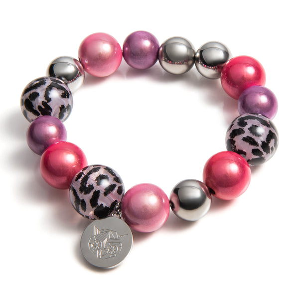 Hangemaakt in nederland, nederlandse design, roze en paarze tinten, panterprint. Unieke combinatie van Materialen. Premium stainless steel.
